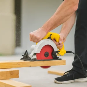 Handyman performing woodwork for a home repair project, showcasing reliable craftsmanship and maintenance services.